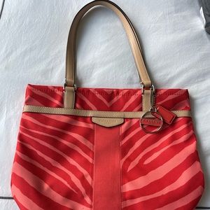 Fun Coach purse.  Great for a night out to liven up your outfit!!